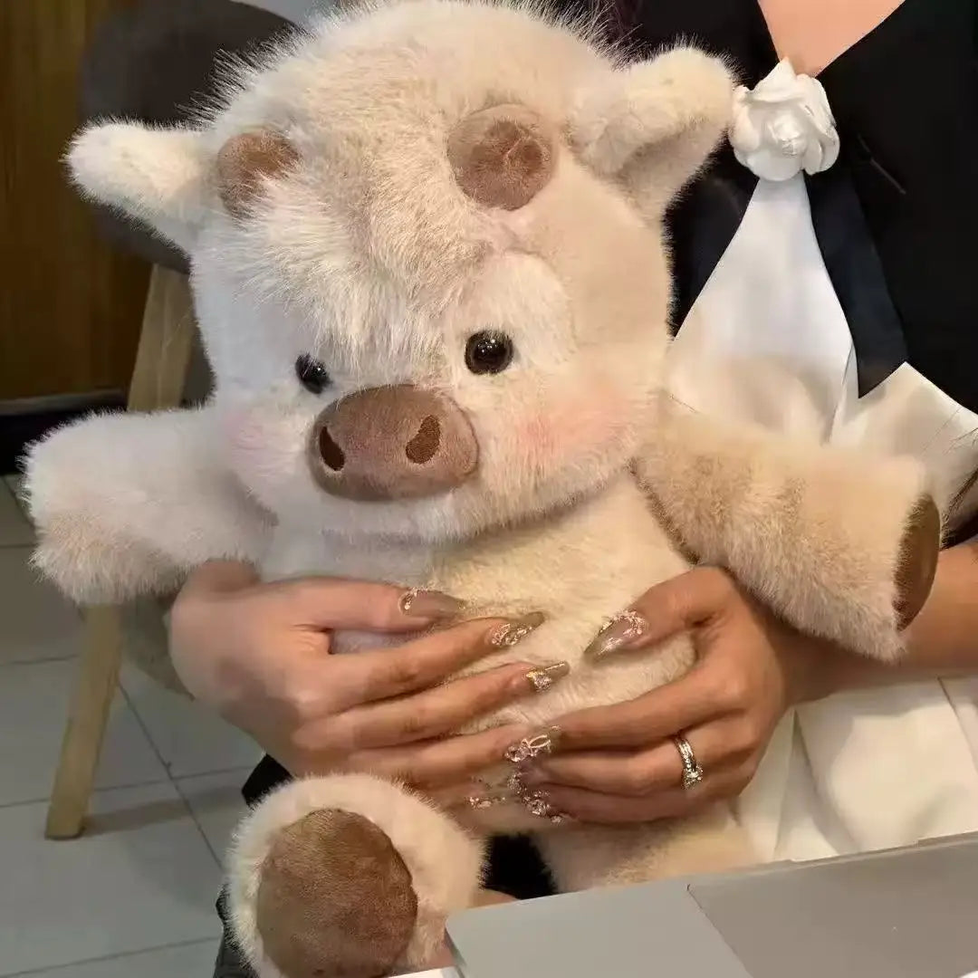 The cutest Cow plush to hug